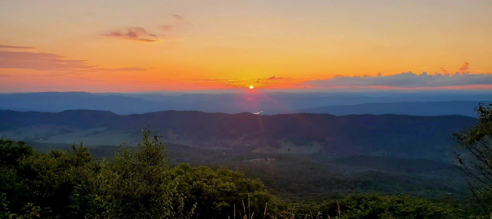 Beautiful view of a forested valley at sunset