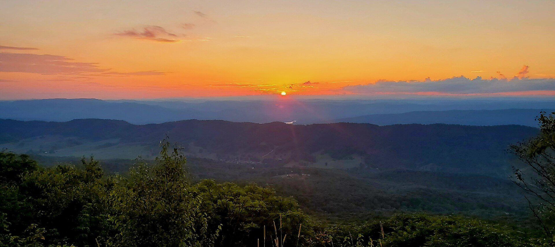 Beautiful view of a forested valley at sunset