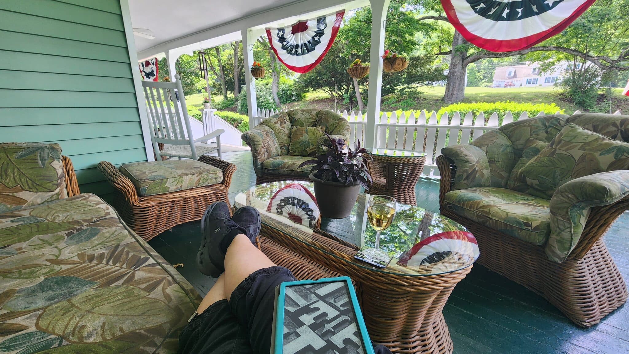 Relaxing on the front porch at Vine Cottage Inn in Hot Springs, Virginia.