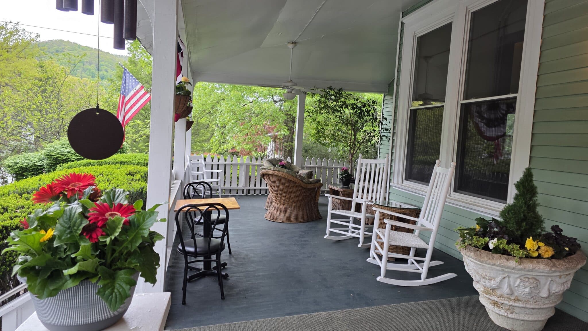 Front porch at Vine Cottage Inn during spring in Bath County, Virginia.